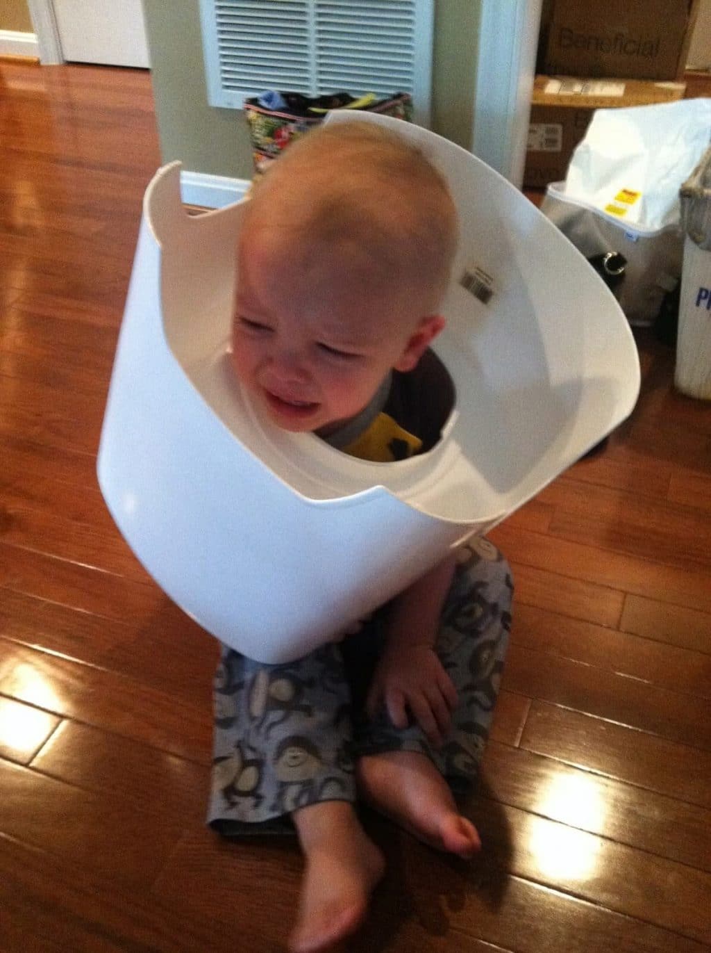While the Mom cleans, the baby gets stuck in the toilet ...