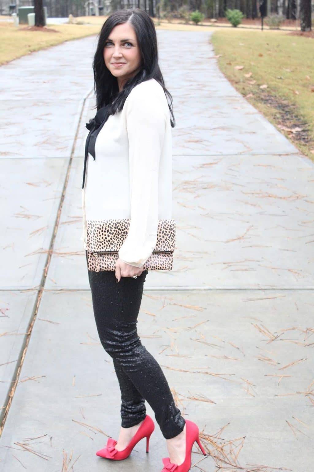 bow blouse, sequin pants, leopard clutch, red heels