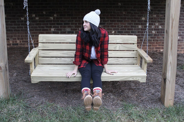 red and black plaid shirt, duck boots, pom pom beanie