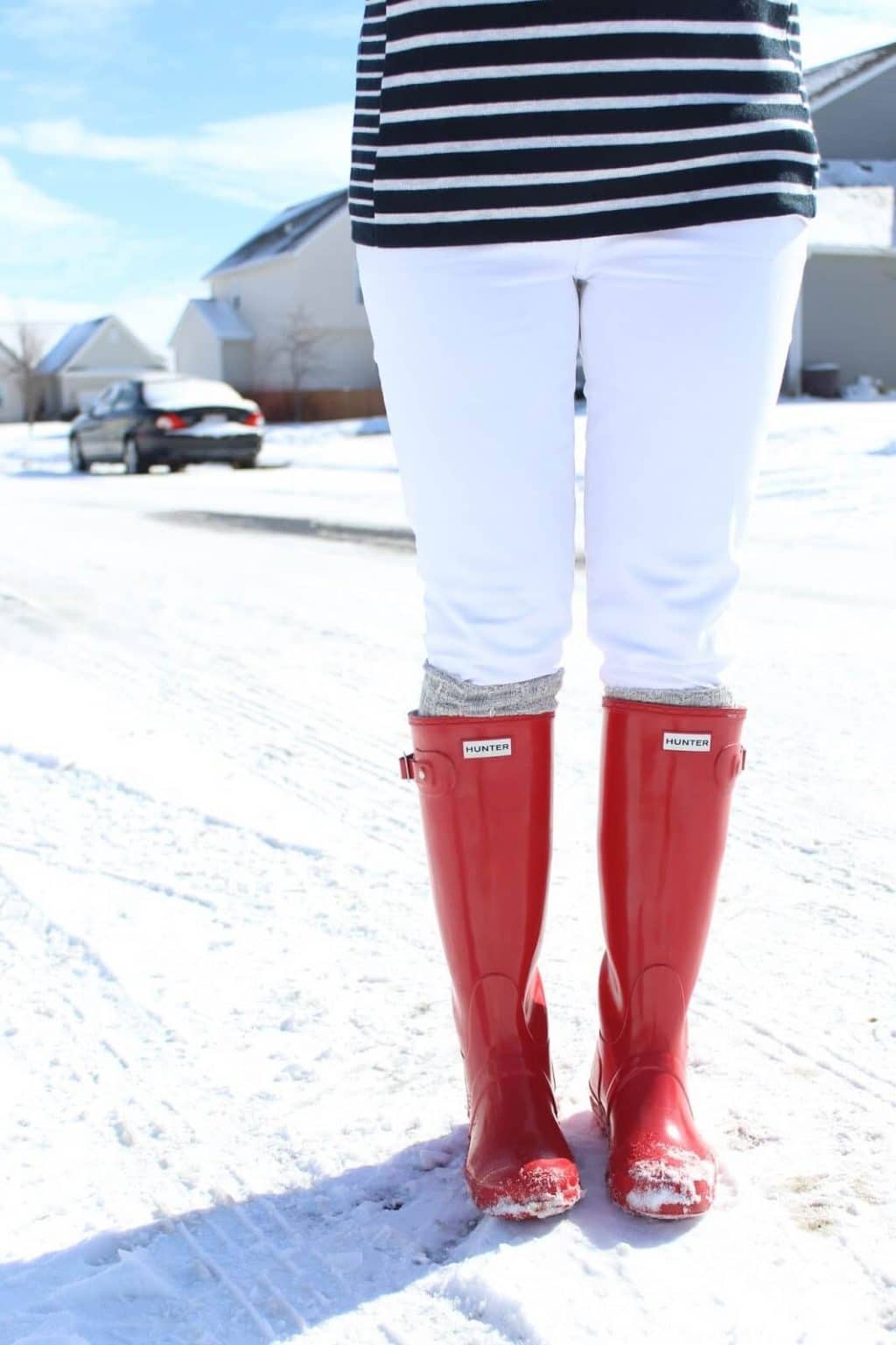 red hunter boots, white jeans, striped sweater 