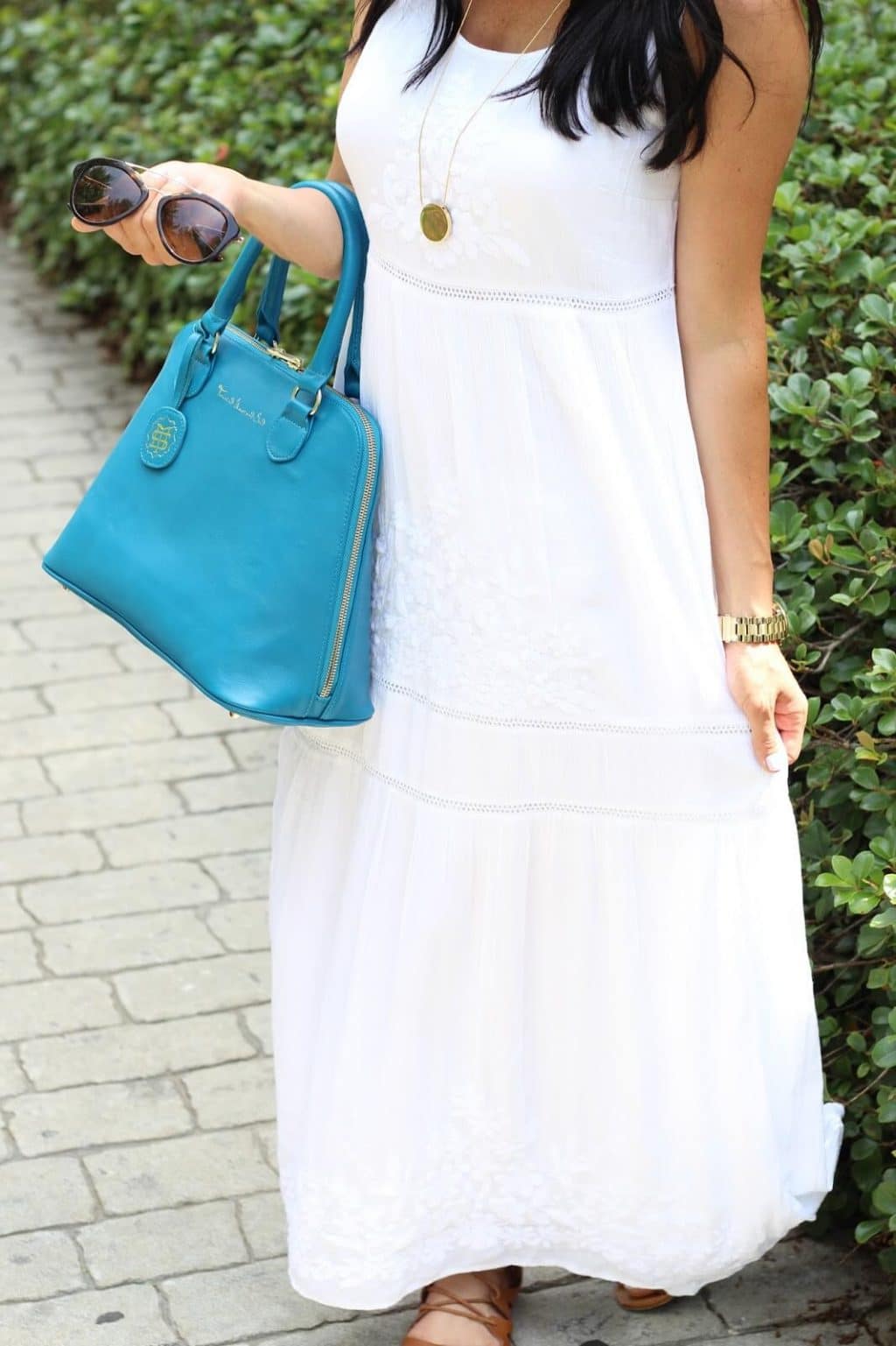 White embroidered maxi dress, turquoise bag, prada sunglasses