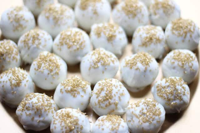 Oreo Ball Truffles are an easy, yet beautiful dessert that can be customized for any party or holiday!