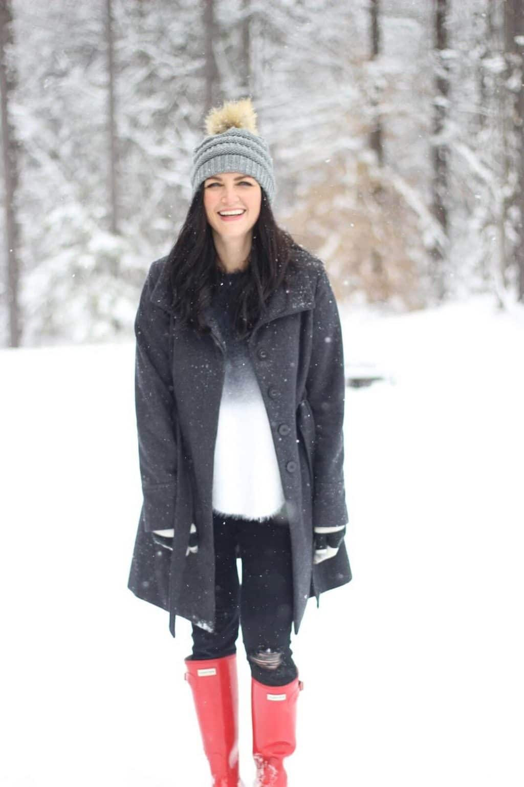 A look for snow with Red Hunter Boots, a Pom Beanie and cozy layers. 