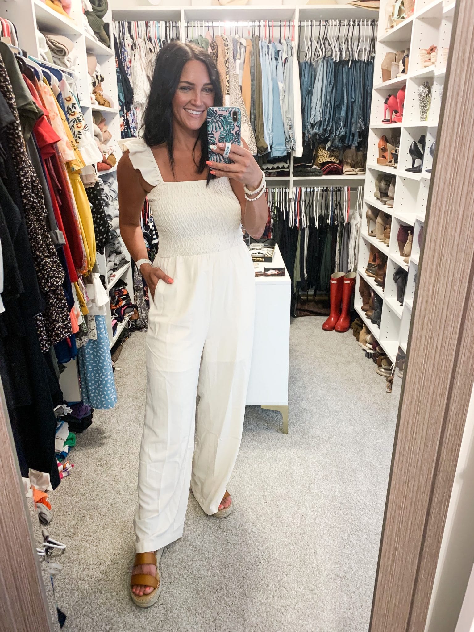 white ruffle shoulder jumpsuit, amazon summer outfits, stilettos and diapers, molly wey