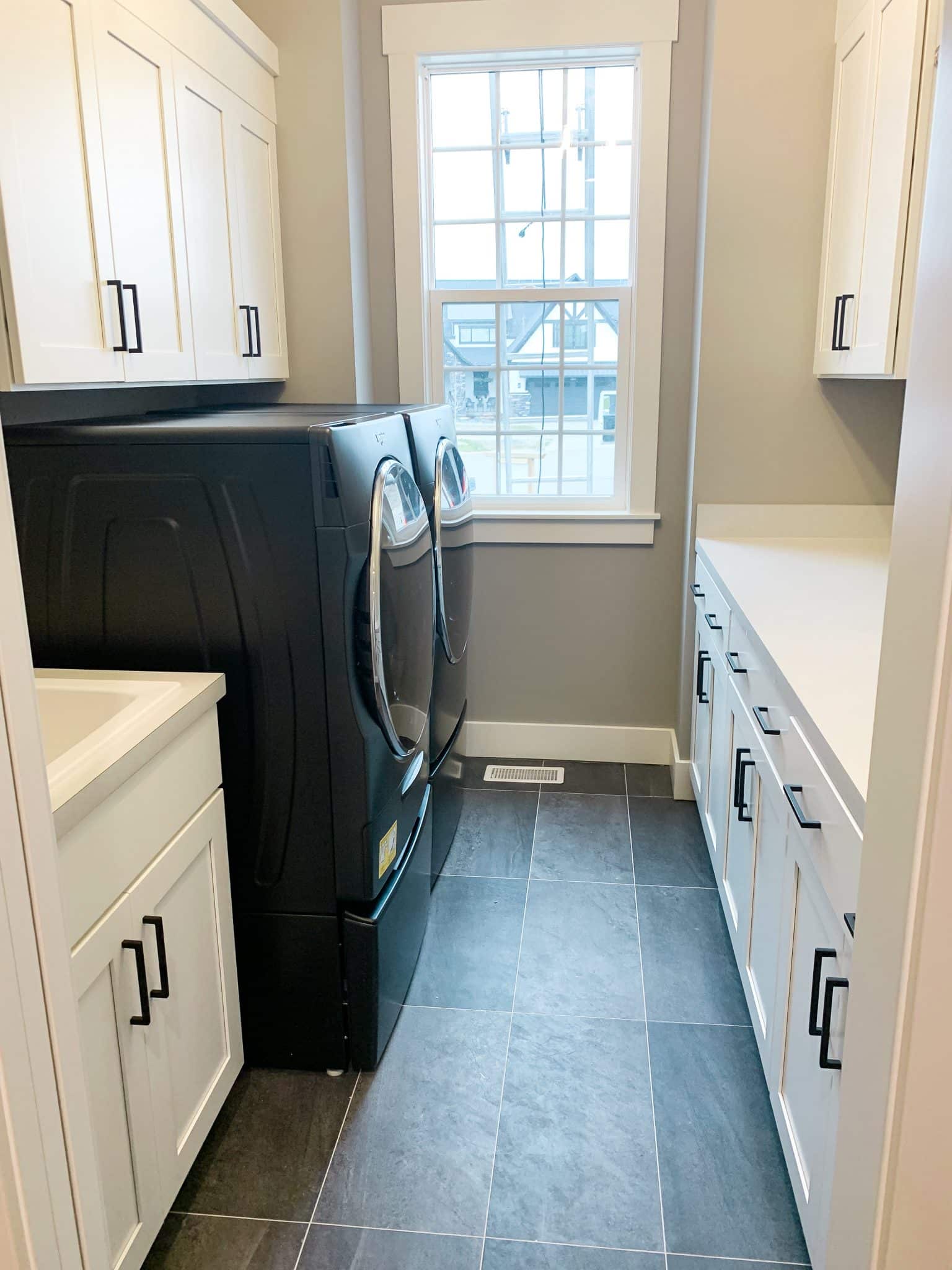 White laundry room, Laundry room cabinets, New Home build ideas, Matte Black laundry, stilettos and diapers