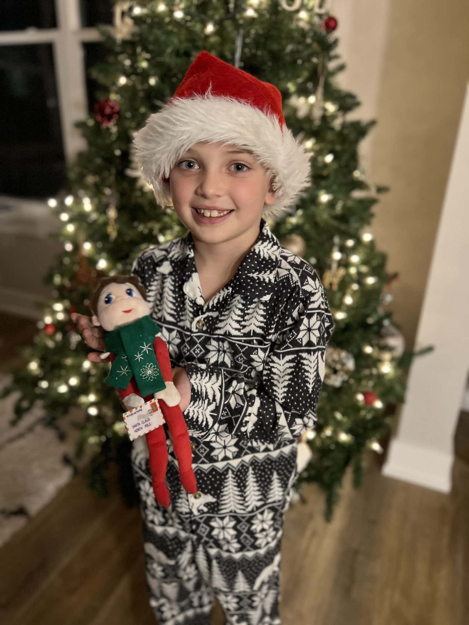 Christmas Eve elf on the shelf hug, stilettos and diapers