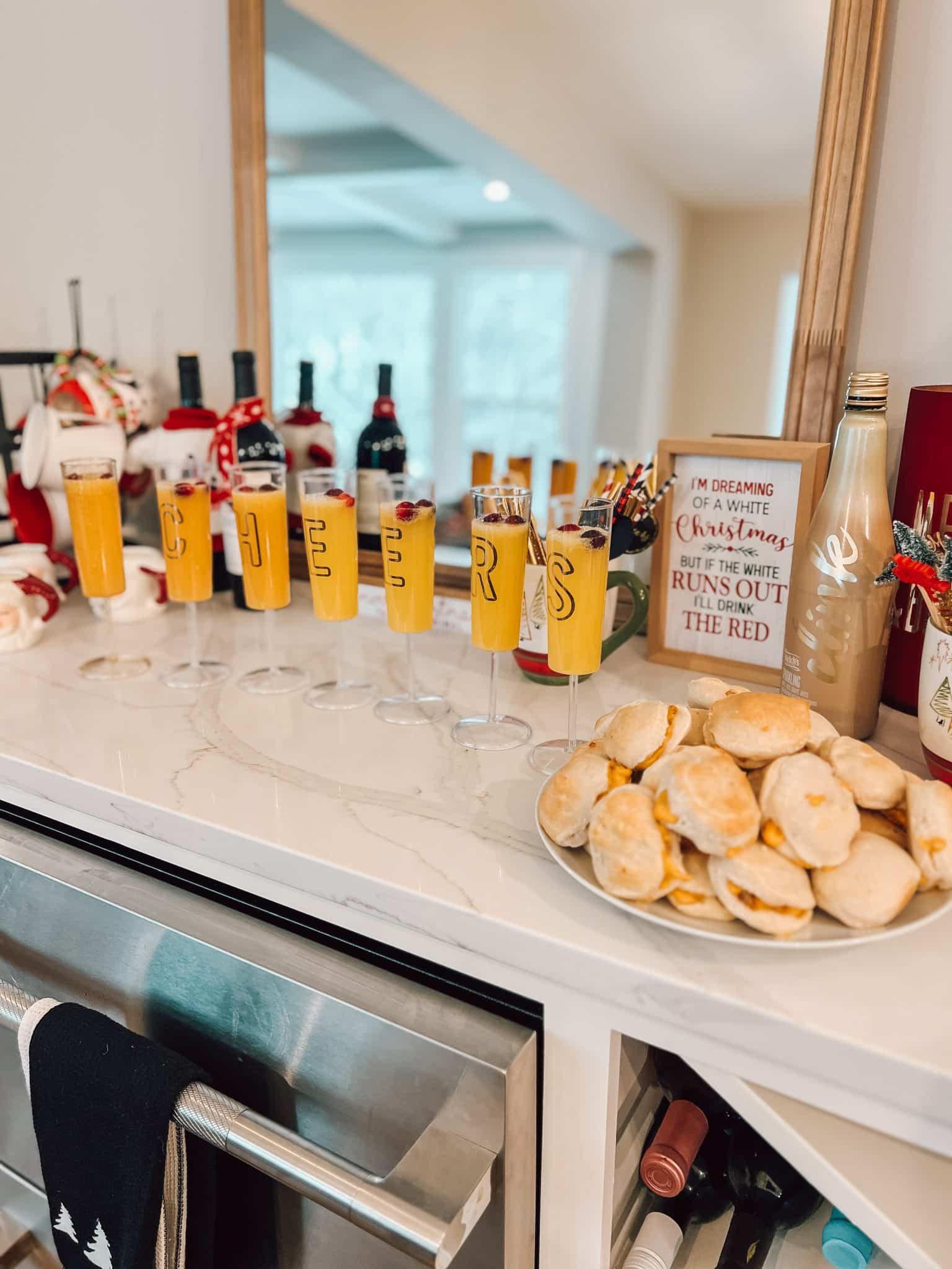 Christmas morning, sausage biscuits, Christmas mimosas, stilettos and diapers
