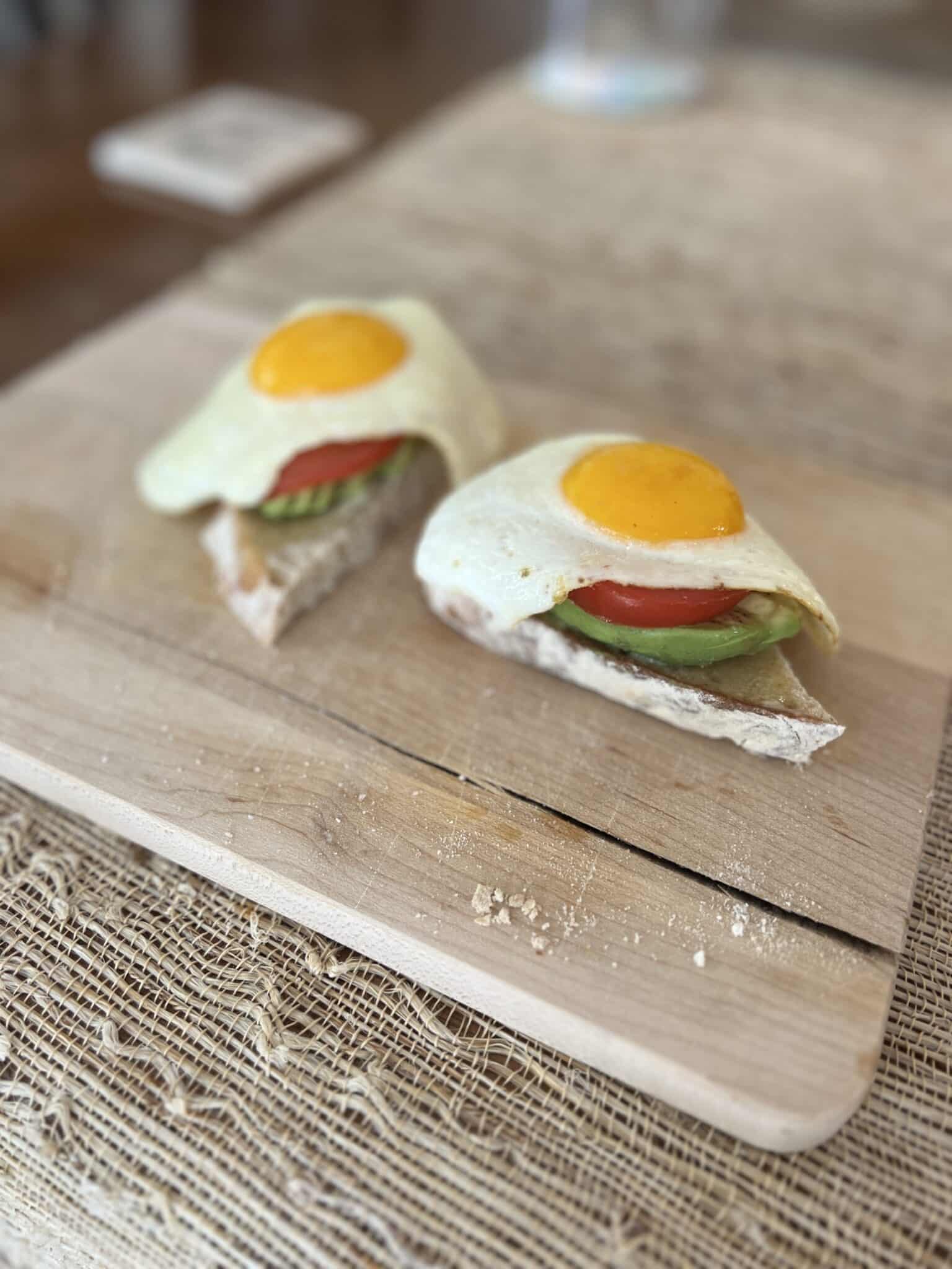 Sunny side up egg, tomato and avocado toast, sourdough toast, stilettos and diapers
