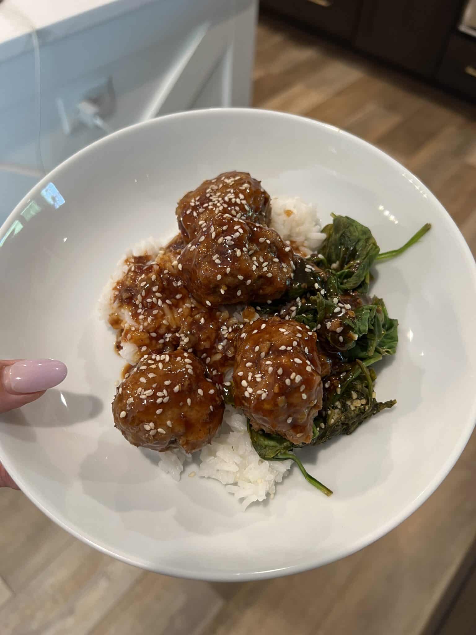 Teriyaki meatballs, rice, sautéed spinach